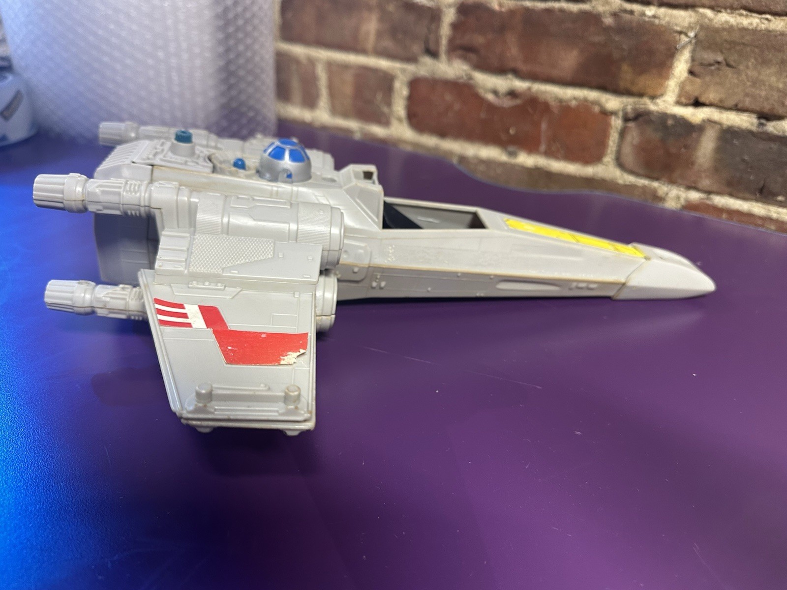 X-Wing Fighter (Battle Damaged) sold