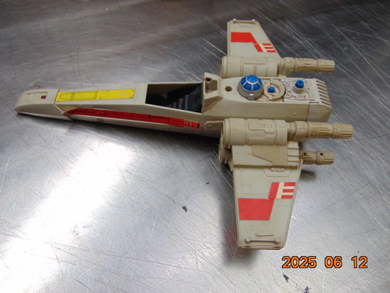 X-Wing Fighter (Battle Damaged) sold