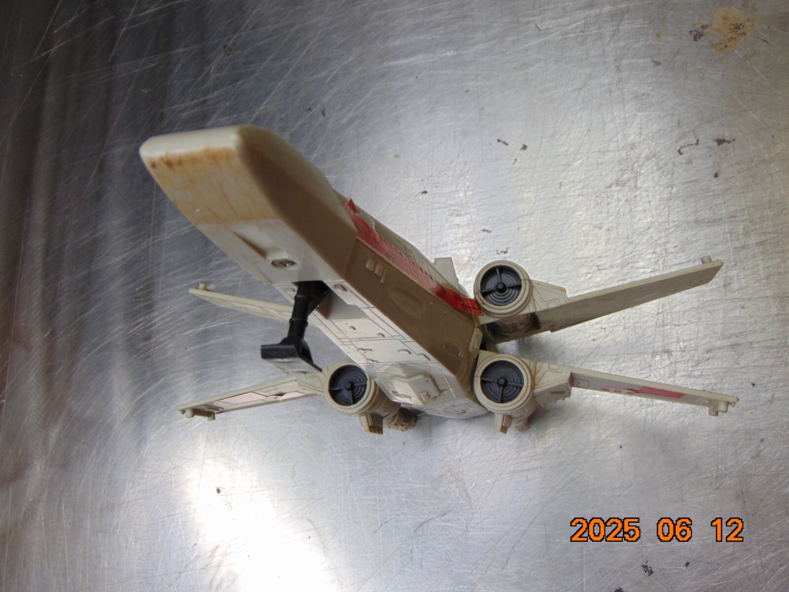 X-Wing Fighter (Battle Damaged) sold